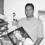 Allen Vincatassin with photo of Queen